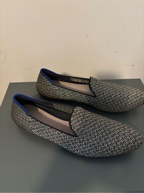 Rothys black and gold metallic slip on loafers.